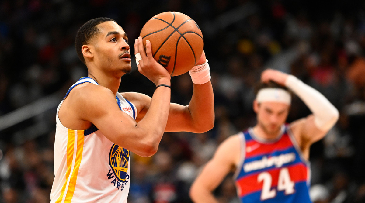 Jordan Poole shoots a free throw in Warriors vs. Wizards game.